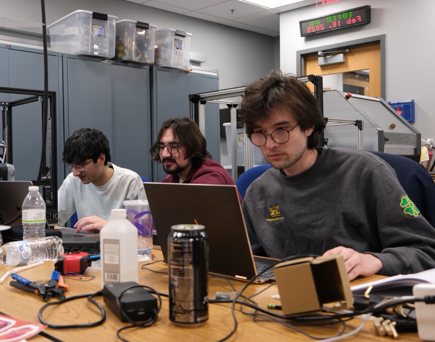 Zach Moas at work in the robotics lab